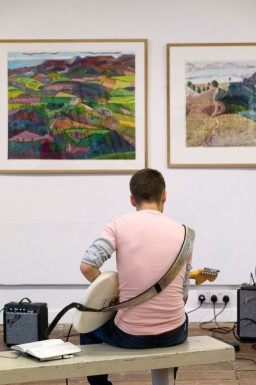 How can young people living in rurally isolated areas be supported to take the first steps towards a career in the music industry?